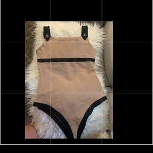 Chanel body suit nwot. Never been worn.